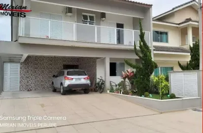 Sobrado a venda em peruibe com 4 suites , espaço gourmet, piscina em condomínio fechado em peruibe