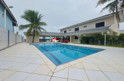 Sobrado para venda em peruibe de frente para o mar com 4 suites, 4 salas amplas, cozinha planejada, 2 banheiros, lavanderia, espaço gourmet com churra