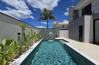 Casa de luxo em condomínio à venda em Peruíbe-SP, Bougainville Residencial IV: 4 quartos, 4 suítes, 3 salas, 5 banheiros, 4 vagas, 218m².