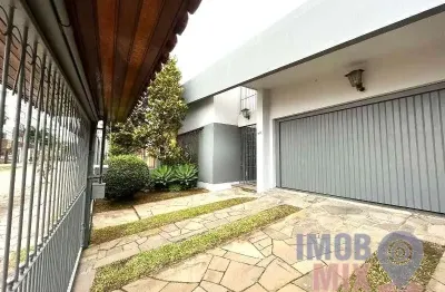 Casa com 3 quartos à venda na avenida doutor walter só jobim, 70, jardim lindóia, porto alegre por r$ 1.200.000