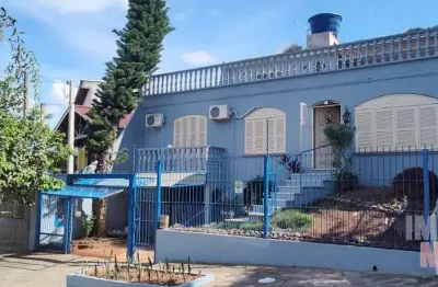 Casa com 4 quartos à venda na travessa marrocos, 45, vila ipiranga, porto alegre por r$ 950.000