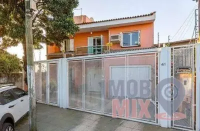 Casa com 4 quartos à venda na travessa gabriela mistral, 41, passo das pedras, porto alegre por r$ 950.000