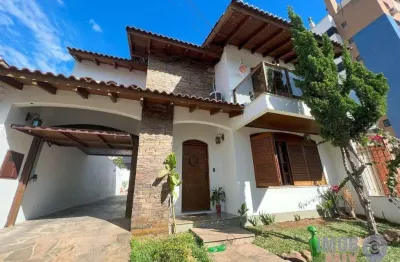 Casa com 4 quartos à venda na rua gaston englert, 522, vila ipiranga, porto alegre por r$ 1.350.000