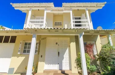 Casa com 4 quartos à venda na avenida josé gertum, 355, chácara das pedras, porto alegre por r$ 2.300.000