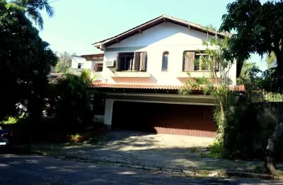 Casa com 3 quartos à venda na rua porto seguro, 335, vila ipiranga, porto alegre por r$ 850.000