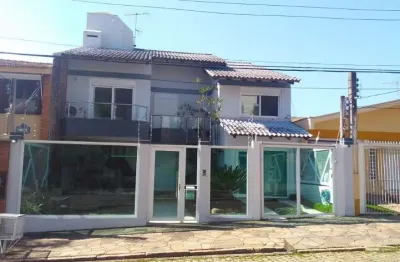 Casa com 3 quartos à venda na travessa java, 115, jardim lindóia, porto alegre por r$ 1.500.000