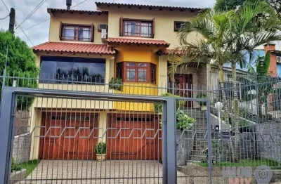 Casa com 4 quartos à venda na rua zeferino dias, 390, sarandi, porto alegre por r$ 1.399.000