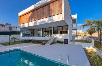 Sobrado com 3 dormitórios para alugar, 450 m² por r$ 23.235,17/mês - condomínio residencial alphaville - são josé dos campos/sp