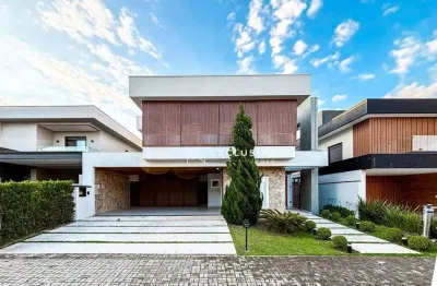 Casa com 5 dormitórios, 430 m² - venda por R$ 5.500.000,00 ou aluguel por R$ 33.907,02/mês - Condomínio Jardim do Golfe - São José dos Campos/SP