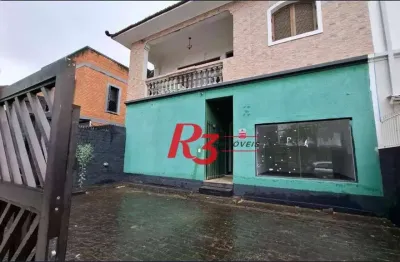 Casa com 3 dormitórios à venda, 238 m² por r$ 1.100.000,00 - gonzaga - santos/sp