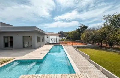 Casa com 4 suítes à venda- condomínio residencial primavera - salto/sp