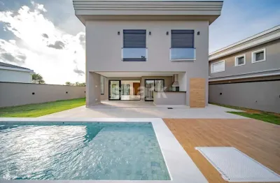Casa nova á venda em alphaville com 4 suítes por r$ 4.850.000,00