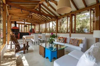 Luxuosa mansão de 4 quartos com 4 suítes e 3 salas à venda em condomínio exclusivo em barueri-sp, bairro morada dos pássaros.