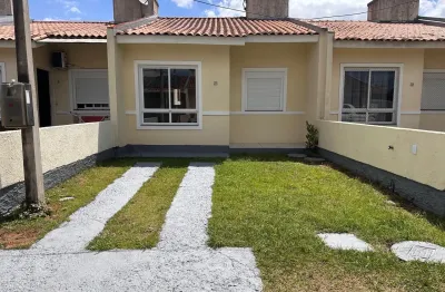 Casa térrea 2 dormitórios + 2 vagas + pátio privativo em condomínio fechado