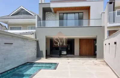 Recreio-casa contemporânea triplex à venda 5 quartos sendo 4 suítes 498m², 3 vagas, piscina-condomínio riviera del sol