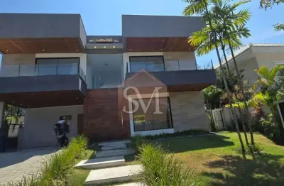 Imponente casa triplex de luxo com 5 suítes na barra da tijuca - condomínio quintas do rio: 860m², 4 vagas de garagem