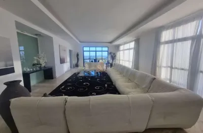 Cobertura triplex na barra da tijuca: 4 quartos, 4 suítes, 3 salas, 8 banheiros, 4 vagas - 1.000 m² de luxo e conforto na praia!