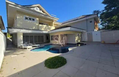 Imponente casa triplex com 4 suítes e placa solar na barra da tijuca, rio de janeiro - 669m² de luxo e conforto