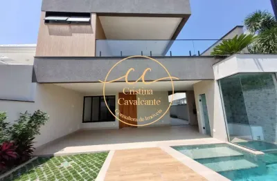 Casa de luxo no recreio dos bandeirantes: 5 quartos, 4 suítes, 469m², piscina e condomínio riviera del sol.