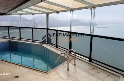 Lindo apartamento na praia das astúrias com piscina na sacada