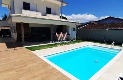 Sobrado a 400m da praia, com 4 dormitórios à venda, 360m² por r$ 1.650.000 - jardim britania - caraguatatuba/sp
