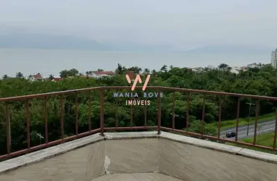 Cobertura duplex, a 200m da praia, com 4 dormitórios à venda, 136 m² por R$ 800.000 - Massaguaçu - Caraguatatuba/SP