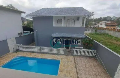 Casa duplex com 3 dormitórios ( entre trevo e entrada de camboinhas)