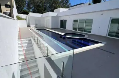 Casa com 4 dormitórios à venda, 519 m² por R$ 4.398.503,00 - Condomínio Estância Marambaia - Vinhedo/SP