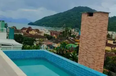 Prédio novo com varanda gourmet e piscina com borda infinita com vista para o mar