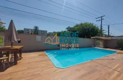 Apartamento térreo, com dois dormitórios, 400 metros da orla da praia grande