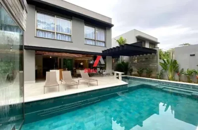 Linda casa em condomínio para venda no bairro riviera, 5 suíte, 4 vagas, 348,81 m, 438,87 m