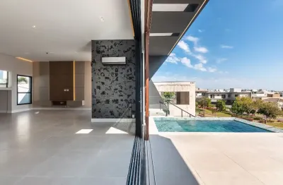 Casa sobrado com elevador e piscina à venda no condomínio alphaville dom pedro 2, em campinas