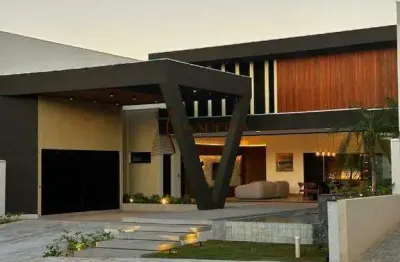 Casa de alto padrão com 4 suítes no condomínio mirante do rio paraná – porto rico/pr