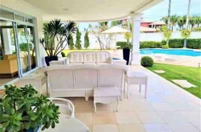 Mansão de luxo na enseada: 5 quartos, 5 suítes, piscina e vista para o mar em guarujá-sp!