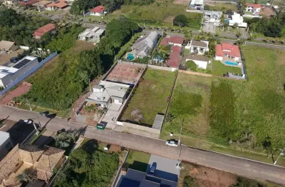 Terreno no condomínio Bougainville V, terreno plano, murado, rua asfaltada