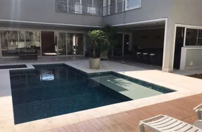 Casa em condomínio fechado com 5 quartos à venda na alameda das sapucaias, 44, alphaville, santana de parnaíba por r$ 6.800.000