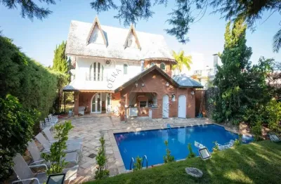 Casa em condomínio fechado com 5 quartos à venda na alameda corvina, 293, alphaville, santana de parnaíba por r$ 4.500.000