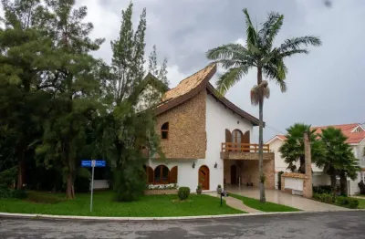 Casa com 4 dormitórios à venda, 422 m² por r$ 2.800.000 - residencial cinco (alp