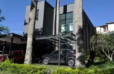 Casa com 460 m², 3 suítes, 3 vagas e espaço de lazer com churrasqueira em jandir