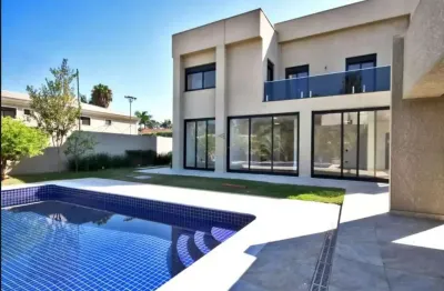 Residencial 2 - casa com 390m², 4 suítes, 2 vagas, piscina e condomínio com muit
