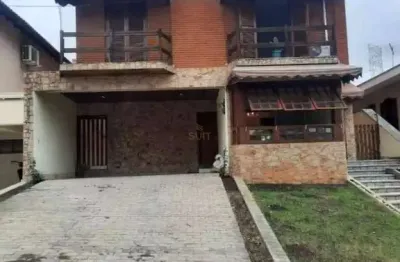 Alphaville 9 - casa com 300m², 3 dorm (1 suíte), 2 vagas, lareira e área com chu