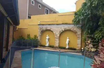 Alphaville 10 - casa com 400m², 4 suítes, 3 vagas e varanda gourmet em santana d