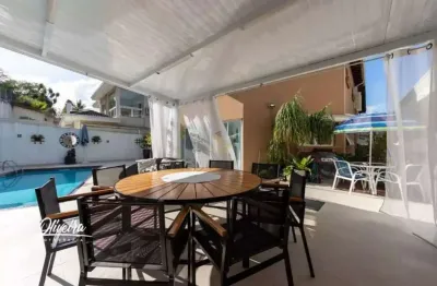 Alphaville 11 - casa com 500m², 4 suítes, 6 vagas e ampla área gourmet em santan