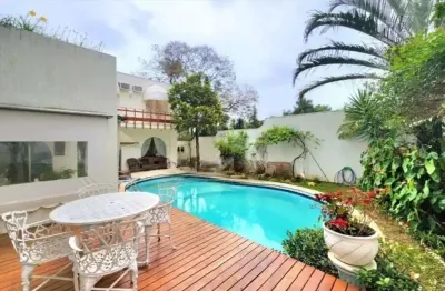 Alphaville 02 - casa com 412m², 4 suítes, 3 vagas, piscina, lareira, jardim em b