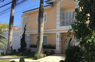 Alphaville 09 - casa com 600m², 4 suítes, 4 vagas, piscina, hidromassagem, adega