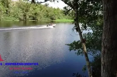 Belíssima chácara em praia de leste, fundos para rio guaraguaçu