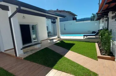 Casa com 3 dormitórios à venda, 187 m² por R$ 980.000,00 - Indaiá - Caraguatatuba/SP