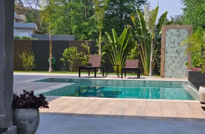 Linda casa alto padrão no condomínio terras caxambu com 4 suítes