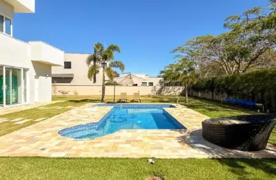 Belíssima casa de alto padrão  com 4 suítes no residencial terra caxambu