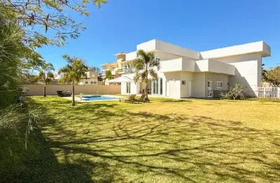 Belíssima casa de alto padrão  com 4 suítes no residencial terra caxambu